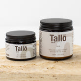 Tallo Skin Sensitive Skin Bundle with All Things Tallow Balm and Skin Tallow Cream jars on stone